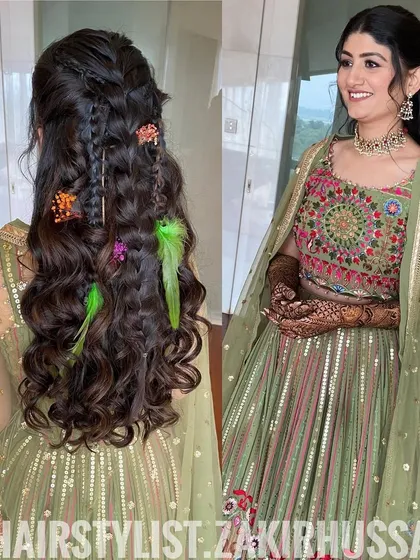 For a fun Mehendi look, I styled the hair in a half-updo with cascading curls. I added playful elements like small braids, colorful floral clips, and bright green feathers to match the vibrant and festive theme of the event.