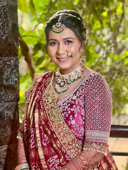 A smiling portrait that captures the bride's happiness. The makeup is designed to look flawless both in person and in photographs, ensuring she feels confident throughout her wedding day.