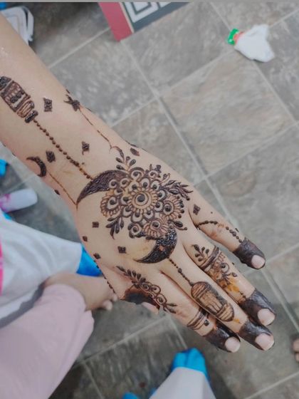 A modern Eid design with moons, lanterns, and a central mandala.