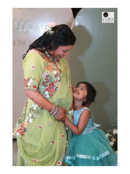 A candid, love-filled moment between a mother-to-be and her daughter during a baby shower. Event photography for me is about capturing these unscripted interactions that show the true language of a family.