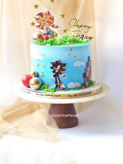 Another angle of the Sonic cake, showing the side details with the classic game-style block pattern and little gold stars.