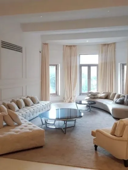 I designed this cozy corner for a family to gather. The large, comfortable sofas are arranged to encourage conversation and connection, proving that luxury can also be warm and inviting.
