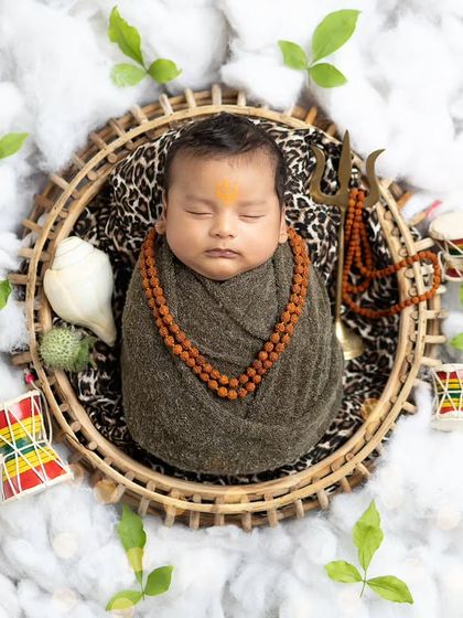 A wider shot of the 'bed of clouds' setup, creating a heavenly scene for our newborn Lord Shankar.