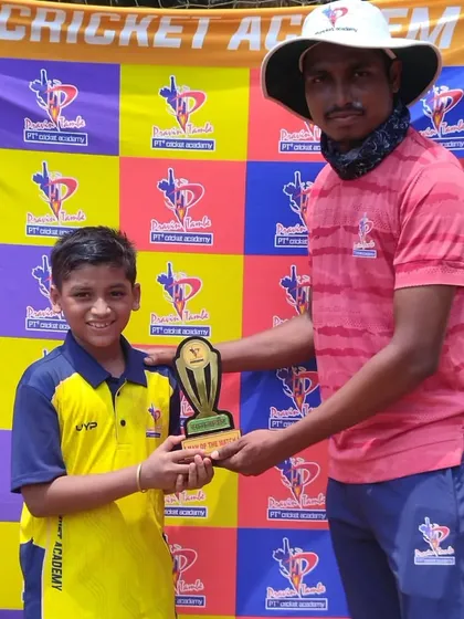 A player from the U-10 yellow team is awarded Man of the Match for his contribution to the team's effort.
