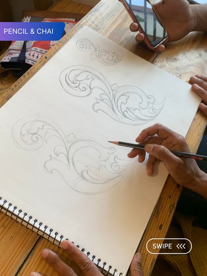 A student practices intricate scrollwork. Our classes are a space for adults to reconnect with their artistic side.