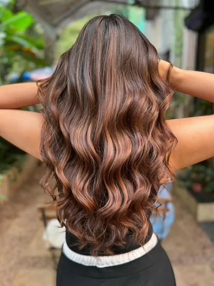 Channeling her inner brunette goddess with this wedding hair. A rich, multi-tonal brown created without bleach to keep her long hair healthy and shiny for the big day.