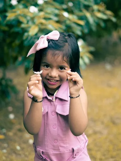 Capturing the pure, unscripted joy of childhood is what I love most. This candid portrait of my niece in the park shows the authentic, heartwarming energy I bring to family and kids' photoshoots.