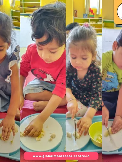 Focused and engaged, our playgroup children practice their knife skills by slicing bananas for a fruit salad, building confidence and fine motor control.