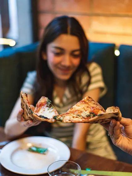 This is the reaction we aim for: pure joy. Our catering is more than just food; it's about creating fun, shareable moments that make your gathering special.