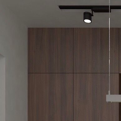 Another angle of the dark kitchen concept, emphasizing the seamless integration of the cabinetry. The design plays with light and shadow to create a moody yet functional culinary space.