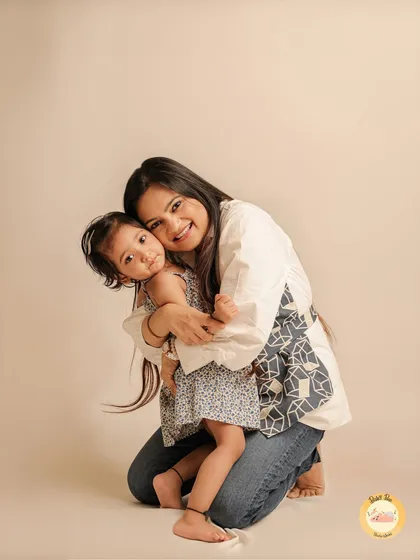A warm and loving hug between a mother and her daughter. Our goal is to capture the authentic emotion and connection that you share.