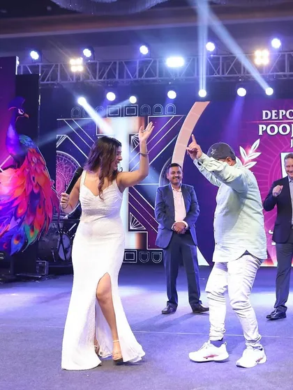 Dancing with a guest on stage at the Berger Paints awards night in Agra. These spontaneous moments are often the most memorable.