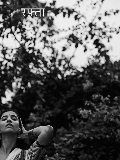 Another shot from 'Rafta', using negative space to create a sense of solitude and freedom. The focus is on the model's serene expression against the backdrop of nature.