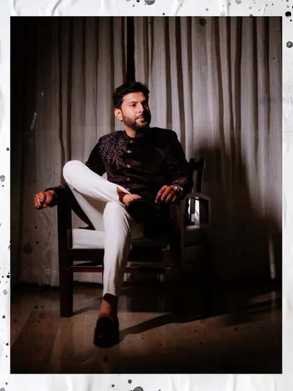 Duplicate of image 416, a stylish portrait of the groom.