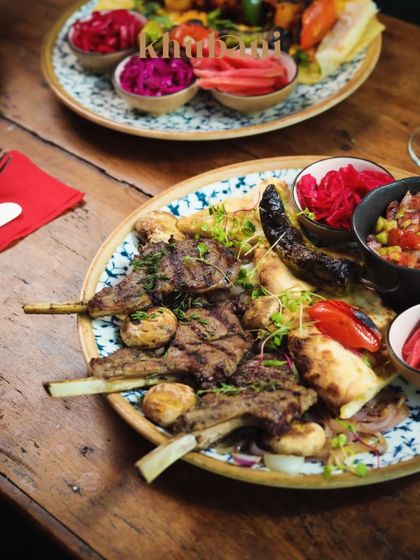 From the kitchen flames to your table. This platter of New Zealand Lamb Chops tells a story of flavor passed down through generations.