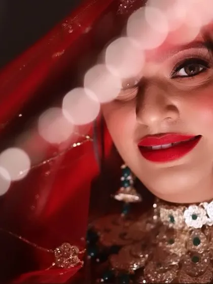 My bride Chandni, winking for the camera. A playful and beautiful close-up shot.