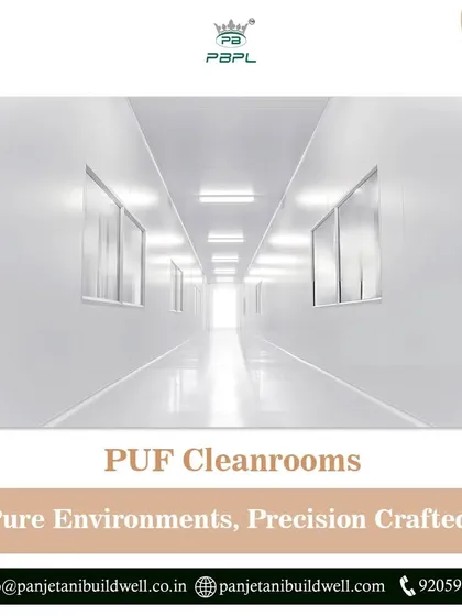 A long, sterile hallway inside one of our PUF cleanrooms. We craft pure environments with precision, ensuring our advanced solutions meet the compliance and efficiency needs of your operations.