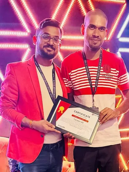 Presenting a certificate of appreciation to a team member for his two years of hard work and dedication. Recognizing achievements is key to our team's success.