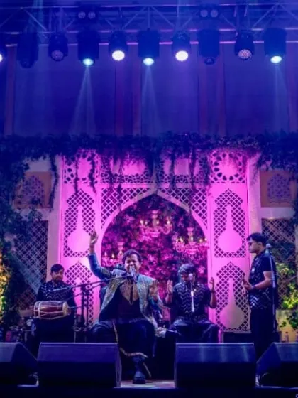 The full band on the magnificent stage at ITC Royal Bengal, a perfect setting for a power-packed performance.