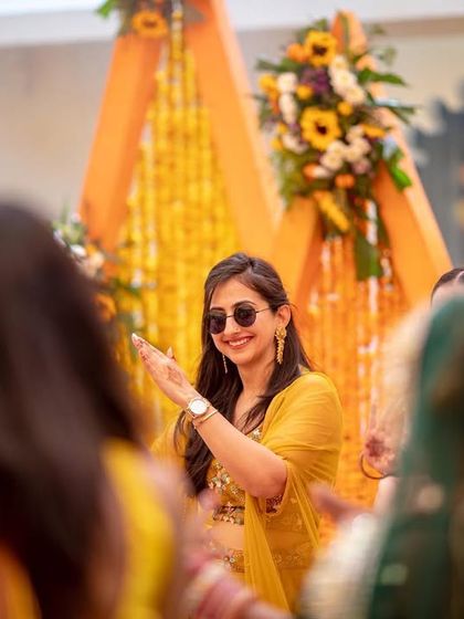 Guests enjoying the music and festive atmosphere at the outdoor Haldi ceremony.