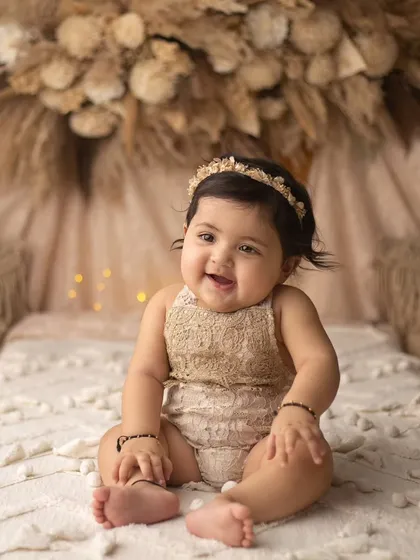 This little bundle of love was so amazing during her session. Her happy, bubbly personality shines in this beautiful boho portrait.