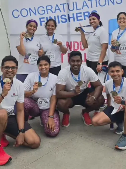The reward at the end of the grind. Our team celebrating together after the Bengaluru 10K Challenge, proudly showing off their finisher medals. This is what community and shared achievement feels like.
