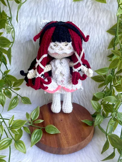 This is Columbina Damselette, a beautifully detailed anime character. The intricate hairstyle with red and black locks and the delicate white dress was a challenge I truly enjoyed creating.