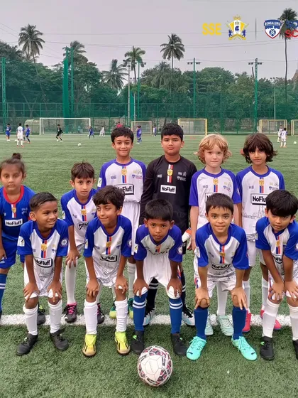 Our U9 team from the Cooperage and Bandra centers, a mix of boys and girls, posing for a team photo. We focus on growing together and building friendships from a young age.