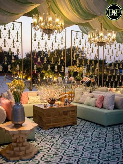 Guest comfort is paramount. We design luxurious lounge areas with plush seating, elegant chandeliers, and detailed decor like the traditional kaleera accents, ensuring your guests have a beautiful space to relax and mingle.