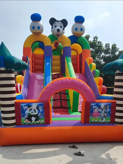 A 3-slider bouncy with panda and cartoon artwork. The palm tree-style pillars add a fun, tropical feel to the classic design.