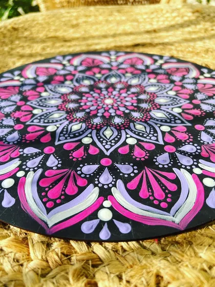 Another angle of the pink and purple dot mandala, showing the raised texture of the dots.