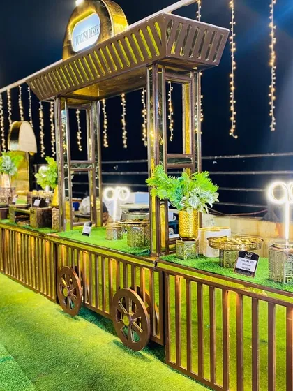 A long shot of the train-cart style counters, a unique and stylish setup for a large event.