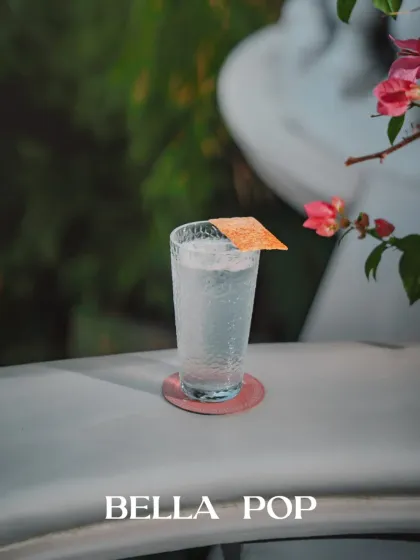 The Bella Pop, a zesty and sparkling mocktail that proves you don't need alcohol for a sophisticated drink.