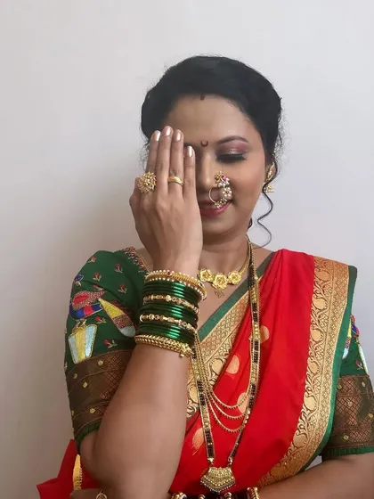 A playful pose that captures the bride's personality. The makeup is designed to be versatile, looking great in both traditional and fun, candid shots.