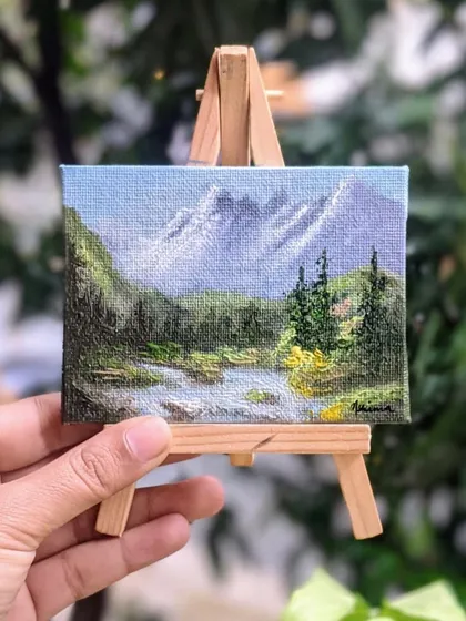 This mountain stream painting looks so cute on its little easel. It’s a complete package that makes a wonderful gift for anyone who loves nature and the mountains. The easel is included with every painting.