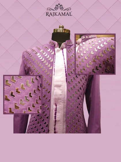 Here is a full view of a unique jacket crafted from a rich purple fabric. The garment is embellished with a geometric pattern of gold foil work, creating a modern and luxurious outfit perfect for a sangeet or festive celebration.