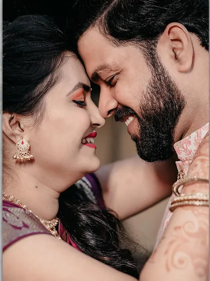 A close up filled with laughter and joy. This engagement photo captures the genuine happiness and easy chemistry between the couple.