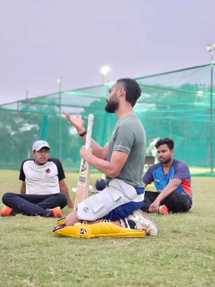 A player sharing his thoughts during a session summary. It's important for me to listen to their perspective and understand their challenges.