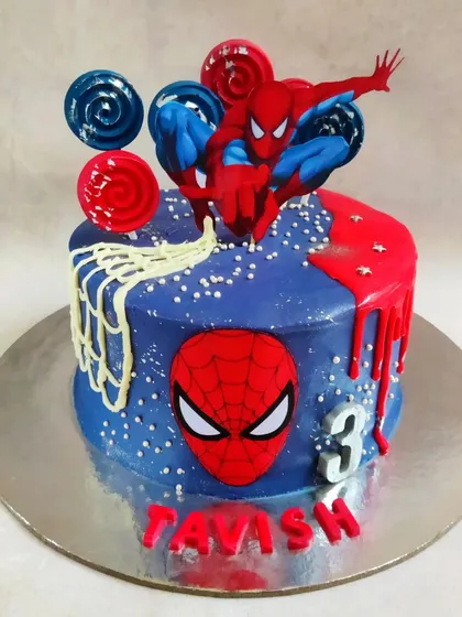 For the little superhero in your life! This Spiderman cake is one of my most requested designs for kids' birthdays. I use vibrant colors and fun details like the web and lollipops to make it a true showstopper.