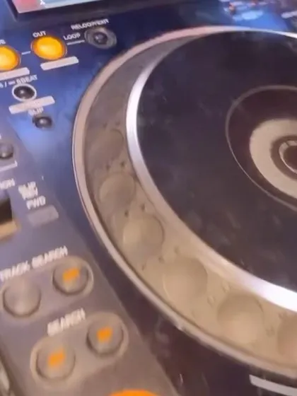 A close-up of the Pioneer DJ deck, the heart of my setup. Using pro-level gear is essential to delivering the best possible sound.