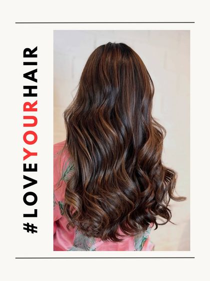 A graphic from our #LoveYourHair series, featuring a beautiful example of our balayage work on long, wavy hair.