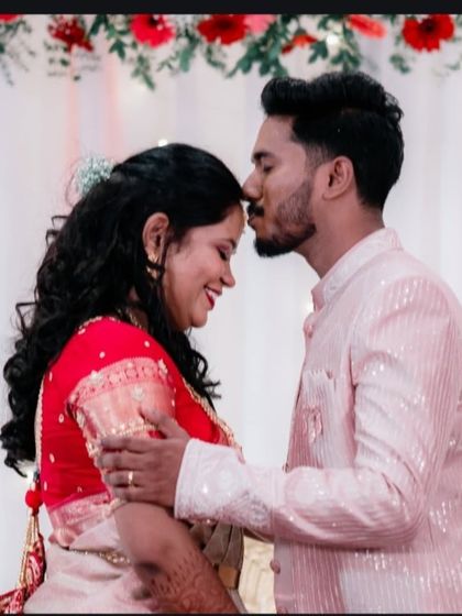 A tender forehead kiss, a classic shot that we capture to signify the love and affection in your relationship.