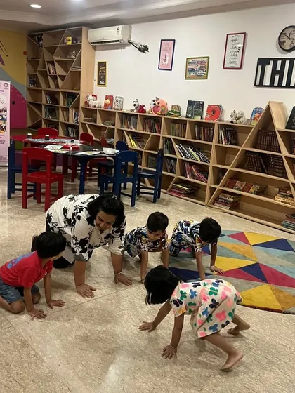 Learning is an adventure here. We were exploring basic physics concepts through a fun crawling game. I believe in play based learning where children use their whole bodies to understand new ideas and develop gross motor skills.