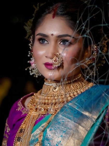 Another beautiful portrait celebrating Narali Purnima. The makeup is designed to be both traditional and glamorous, perfect for the festive spirit of the occasion.