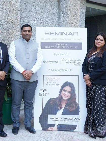 Posing with fellow advocates and organizers of the domestic violence seminar. It takes a dedicated team to spread legal awareness effectively.