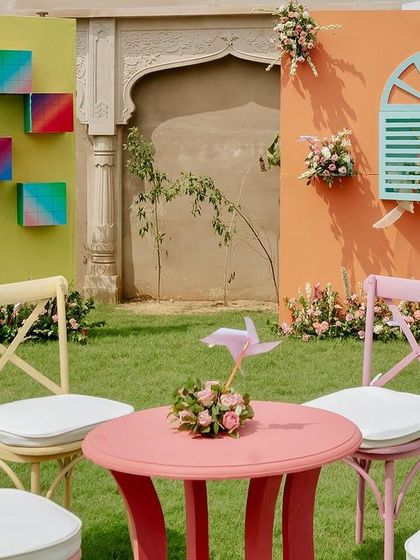 A charming and colorful seating nook at the carnival Mehendi, perfect for guests to relax and chat.