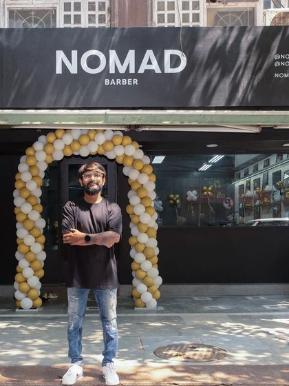 Standing proudly in front of Nomad Barber Mumbai on opening day. After weeks of hard work, seeing this dream become a reality was an incredible feeling. This is the result of years of planning and passion.