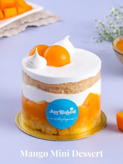 Our Mango Vanilla Mini Dessert is a perfect single-serving treat. It features layers of light vanilla sponge, juicy mango pulp, and fresh cream, offering a burst of tropical flavor in every bite.