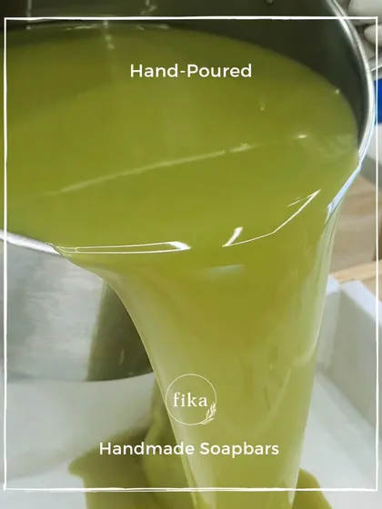 This vibrant green, hand-poured soap batter is the start of something beautiful. It's a visual promise of the fresh, plant-based ingredients and nourishing properties that will be locked into the final bar.