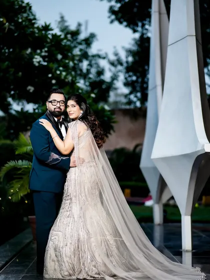 A confident and stylish pose from the couple during their engagement shoot.